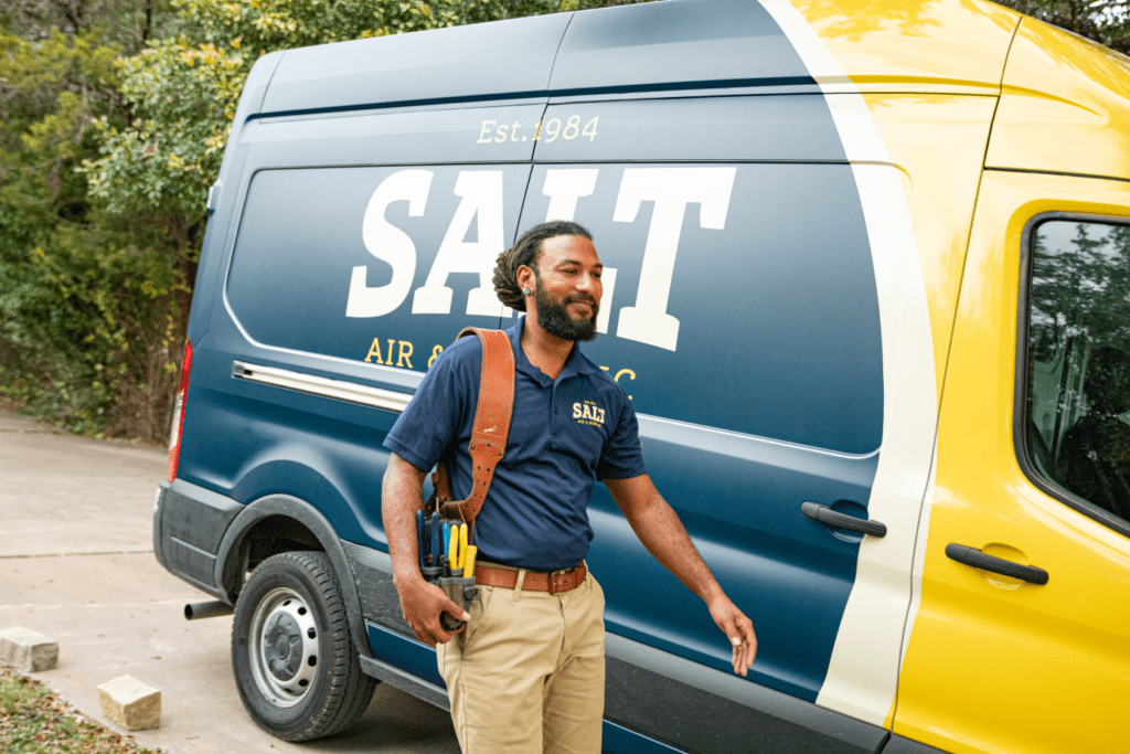 salt hvac electrician next to van